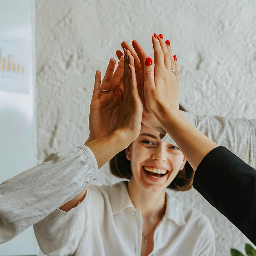 Members of a women's support group celebrating together