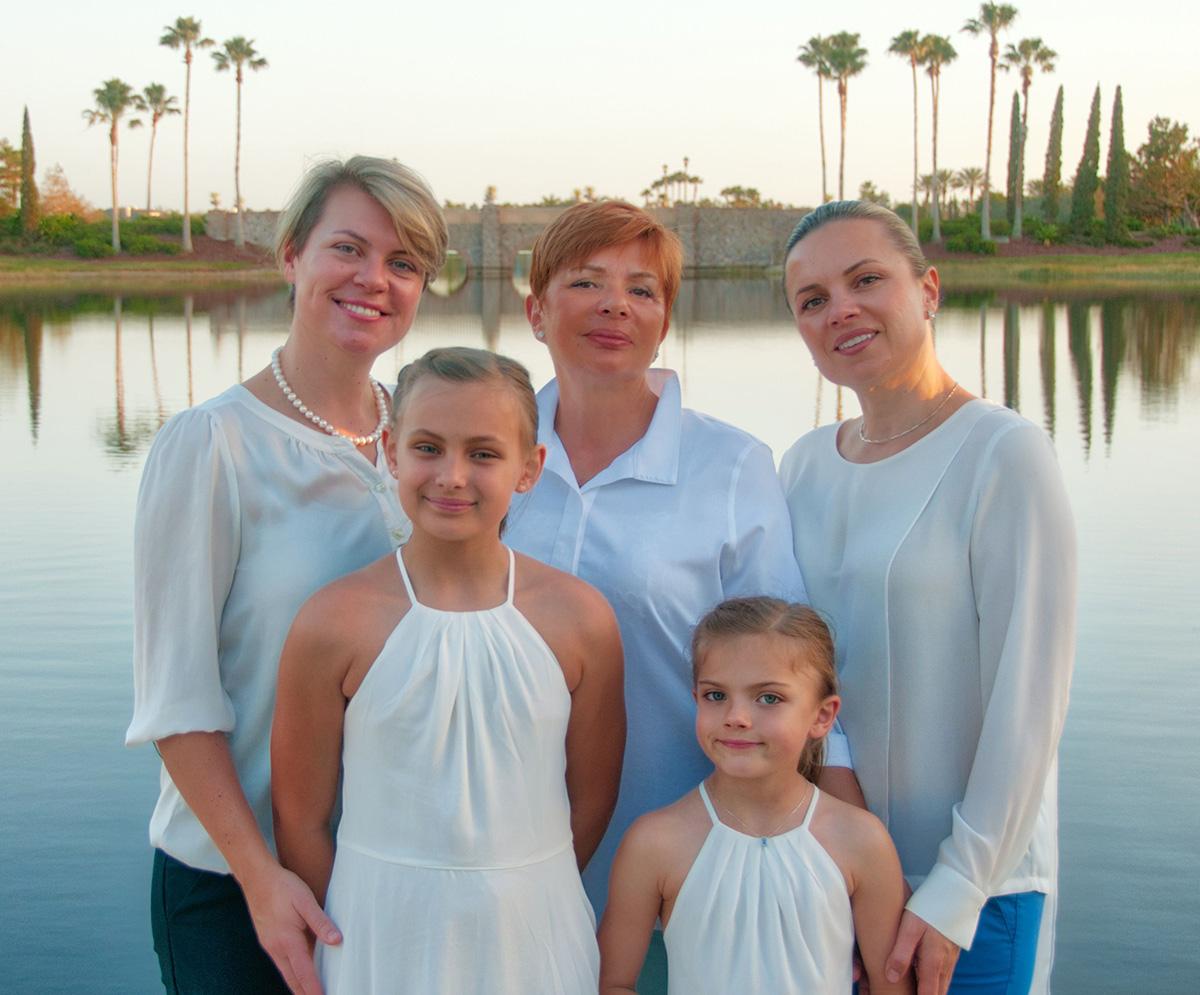 Dr. Marina Tourkova and family — founders of the Center of Revitalizing Psychiatry, by the water