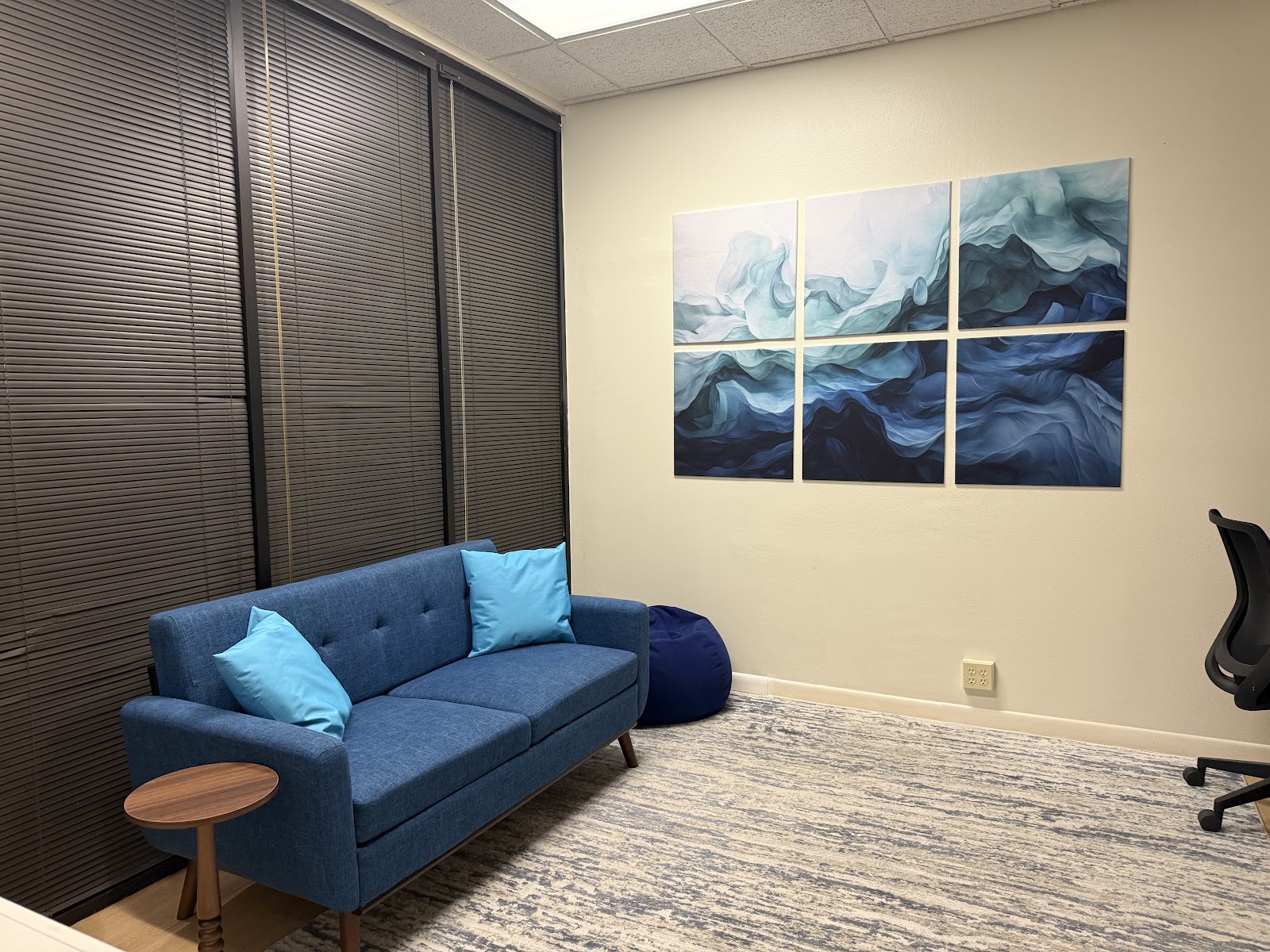 Therapy office with a blue couch