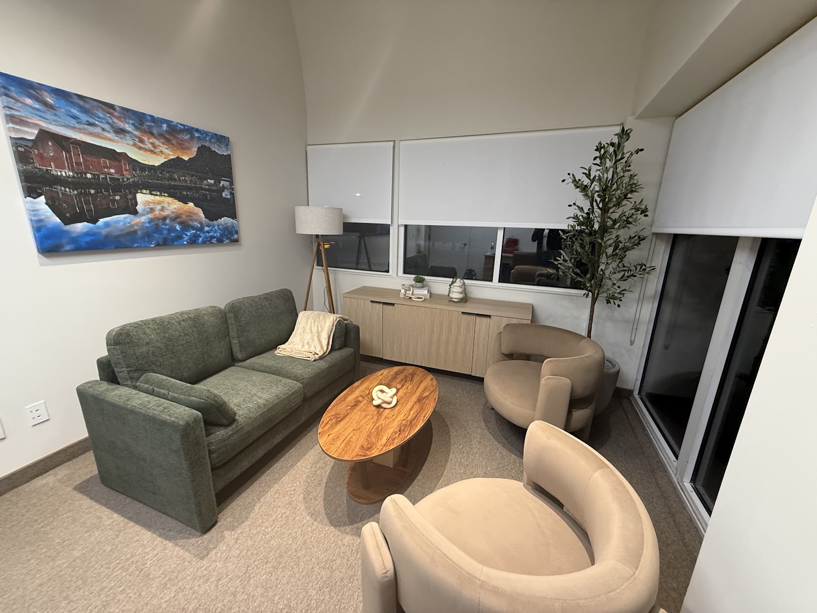 Waiting room with a green couch